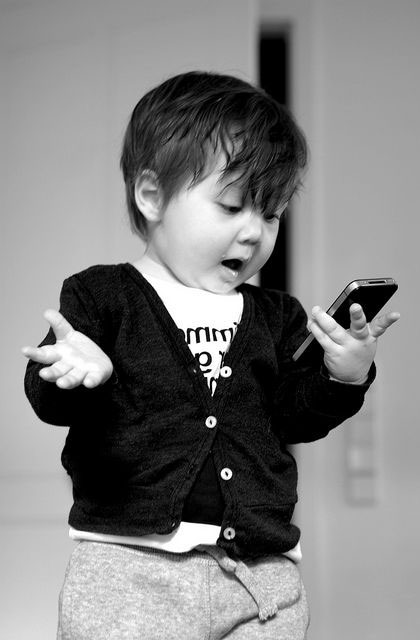 Kid Playing with Mobile Friendly Smartphone